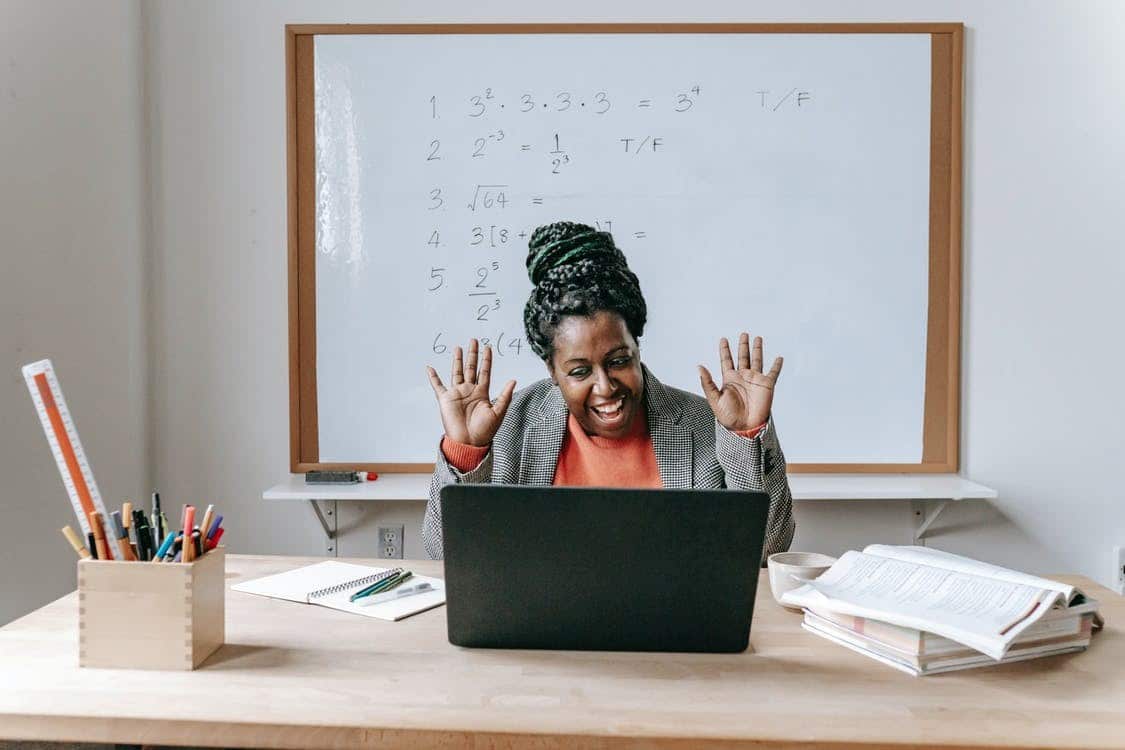 A teacher teaching her online math class