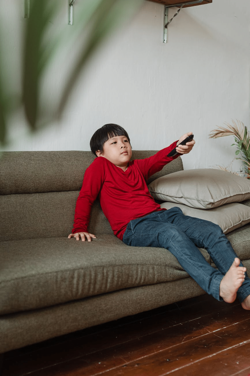 A child watching TV at home