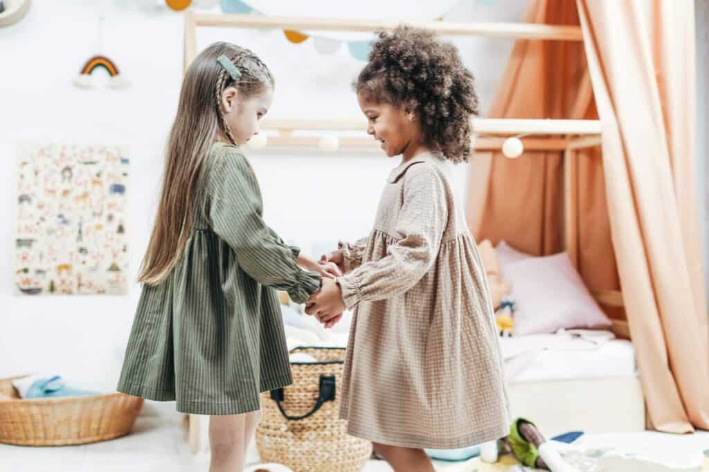 Two little girls playing together