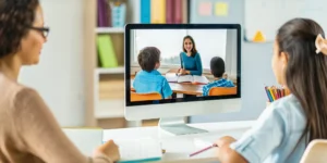 A family learning together during a live teaching session from an accredited K-12 online school.