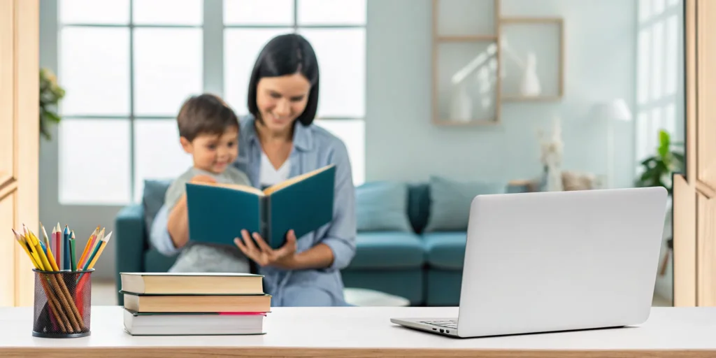 Parent and child researching accredited K-12 homeschool programs on a laptop.