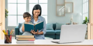 Parent and child researching accredited K-12 homeschool programs on a laptop.