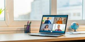Laptop showing an online school class with year-round enrollment for expat students.