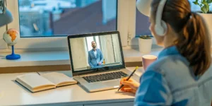 Online education on a laptop for a young US citizen living abroad.